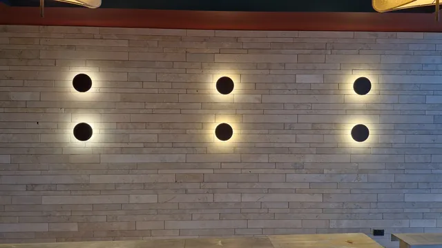 Six halo wall lights at the Palace Hotel.