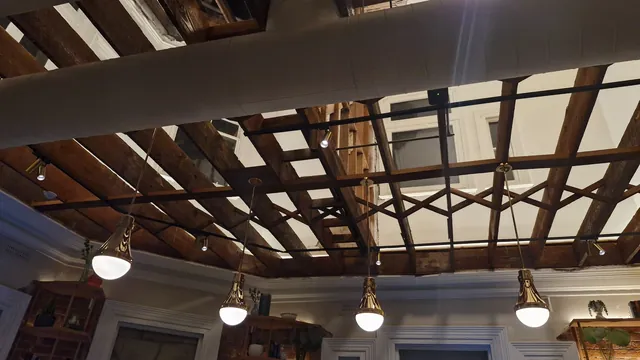 Pendant and track lighting within the Palace Hotel’s heritage structure.