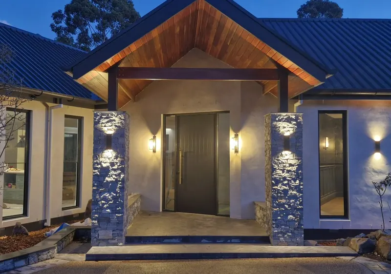 Architectural lighting at the entrance to a private residence.
