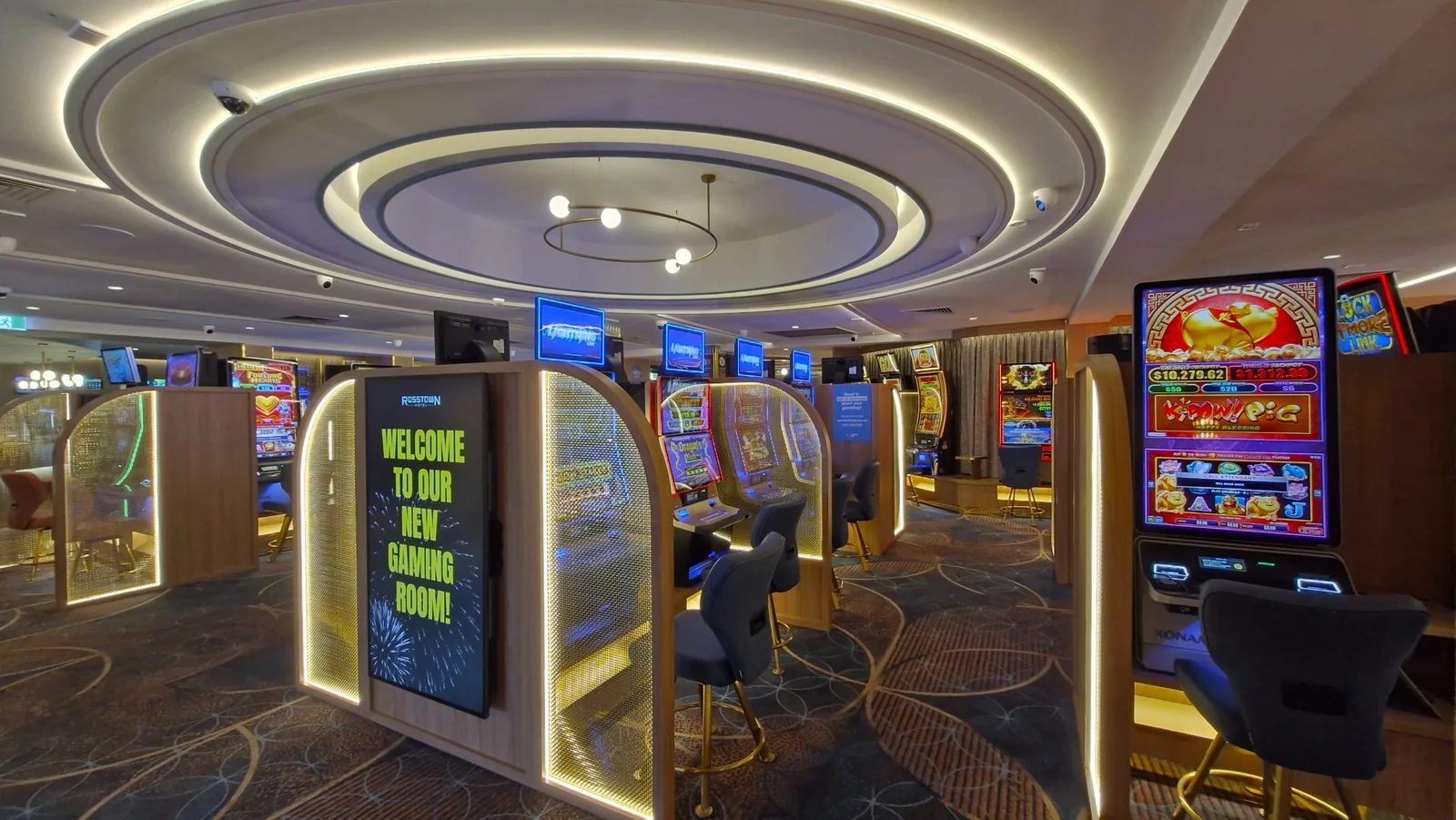 Ceiling rings and illuminated gaming areas at the Rosstown Hotel.