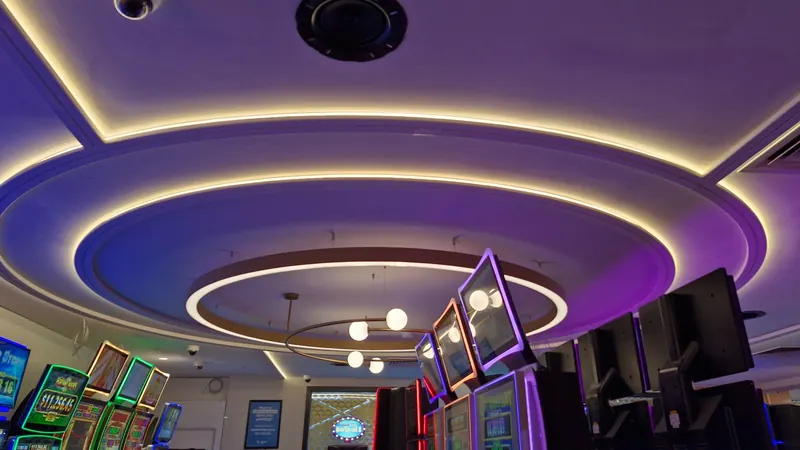 Concealed LED strip lighting and feature pendants at the Rosstown Hotel.